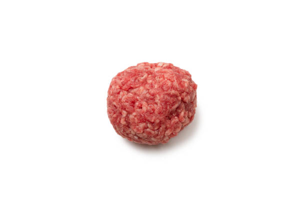 istock Raw meat balls isolated on white background. 1308637879