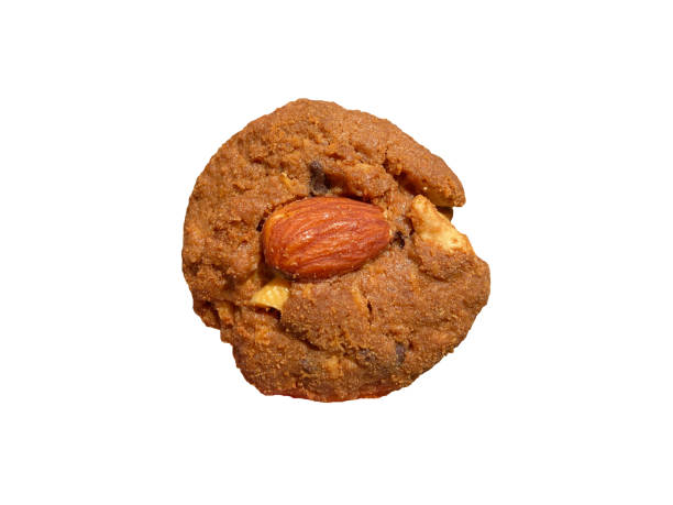 istock fresh cookie almond nut isolated on white background. 1308639353