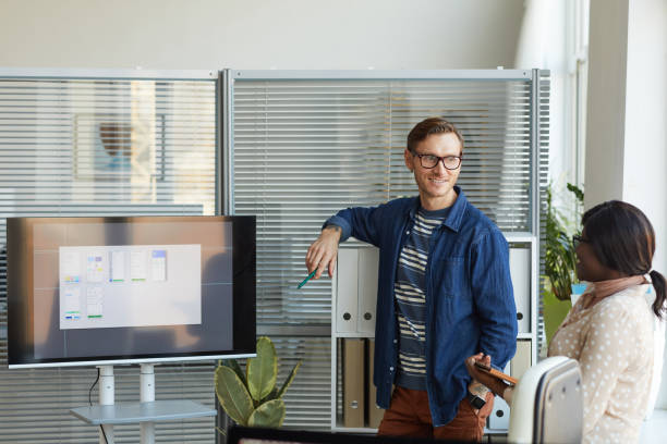 istock Smiling IT Team Leader in Meeting 1308639735