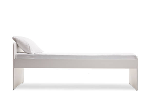 istock Studio shot of a white single bed with a mattress 1308640369