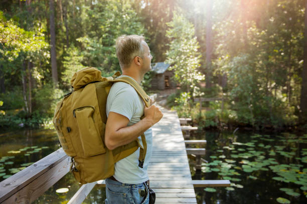 istock Mature man exploring Finnish nature in summer 1308642321