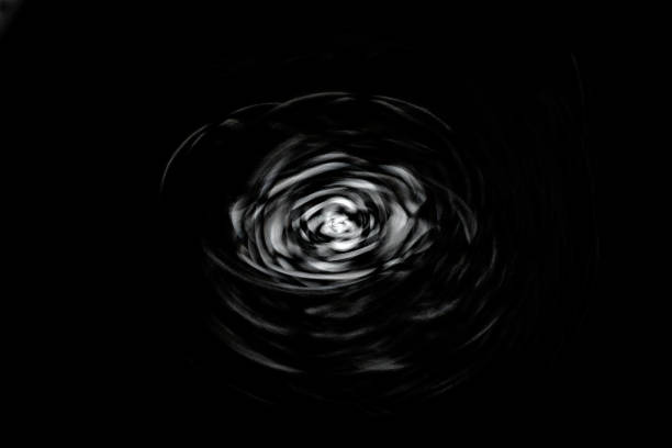 istock Abstract white digital curves on black background  - twirl effect 1308642412