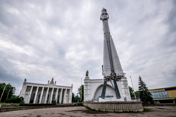 rocket spaceship on the launch pad of the cosmodrome against the background of the sky and clouds