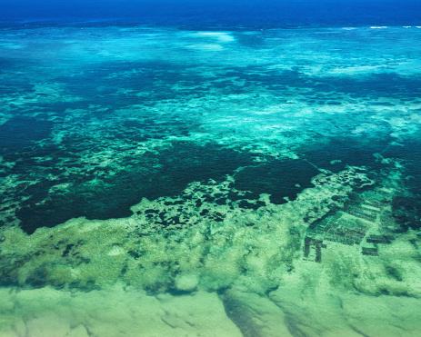 Aerial view on sea patterns (coast of Zanzibar island, Tanzania).