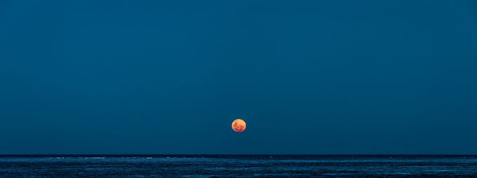 Panoramic view on seascape with full moon (Zanzibar, Tanzania, Africa).