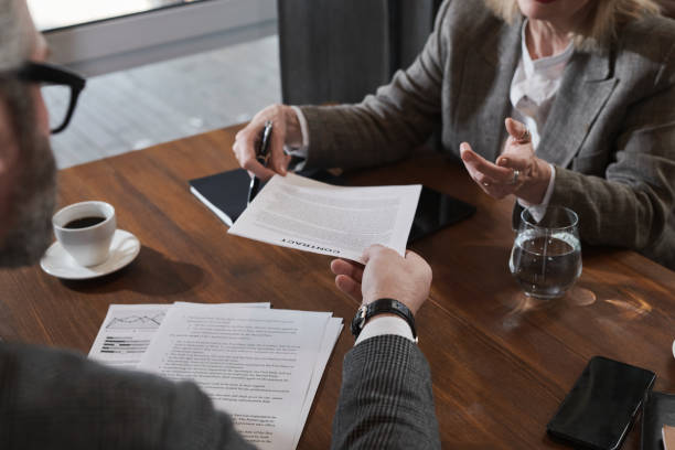 istock Signing business contract in cafe 1308645973