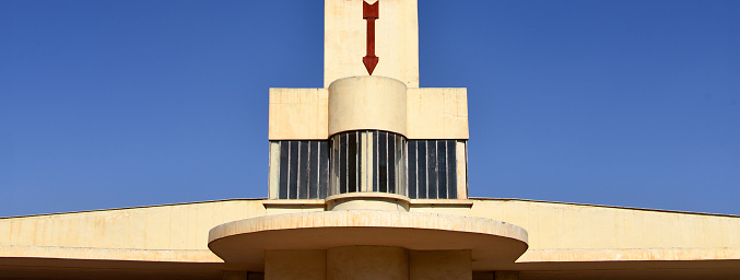 Asmara, Eritrea: Italian colonial architecture - art deco Fiat Tagliero building (1938) - a flamboyant futuristic service station designed by Giuseppe Pettazzi in the shape of an airplane - a symbol of technological avant-garde - intersection of Sematat Avenue and Mereb Street - Asmara: a modernist city of Africa, Unesco World Heritage Site.