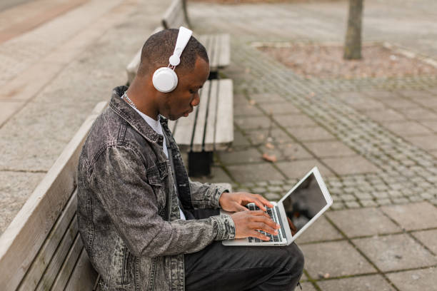 istock Man studying outdoors 1308648483