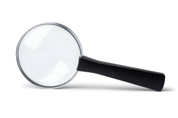 istock Single magnifying glass isolated on white background 1308652635