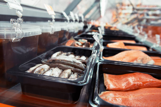 istock Fish and seafood stall in a market 1308653715