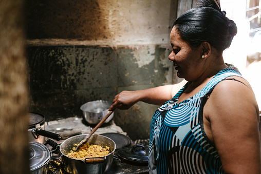 Brazilian woman preparing lunch