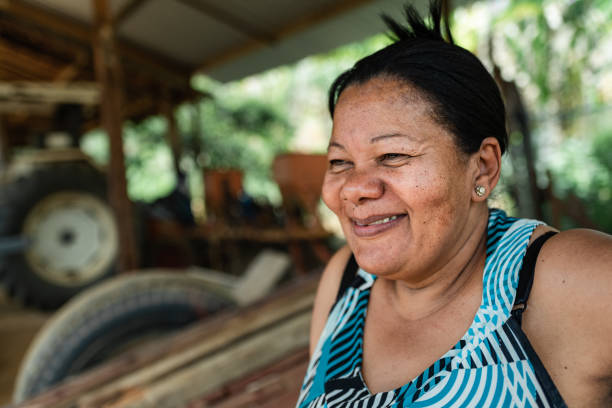 istock Smiling farmer woman 1308654801