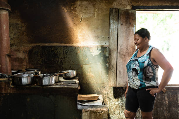 Woman at wood stove