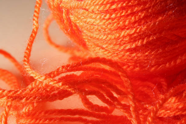 istock close-up orange wool rope on a background 1308655295