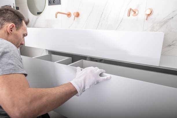 istock Specialist Finishing Bathroom Cabinets Assembly 1308657180