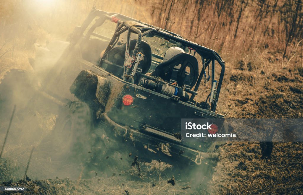 Off Road Vehicle Adventure Trip Off Road SUV Car Adventure Trip. Powerful Sport Utility Vehicle on the Muddy Wilderness Trail. 4x4 Stock Photo