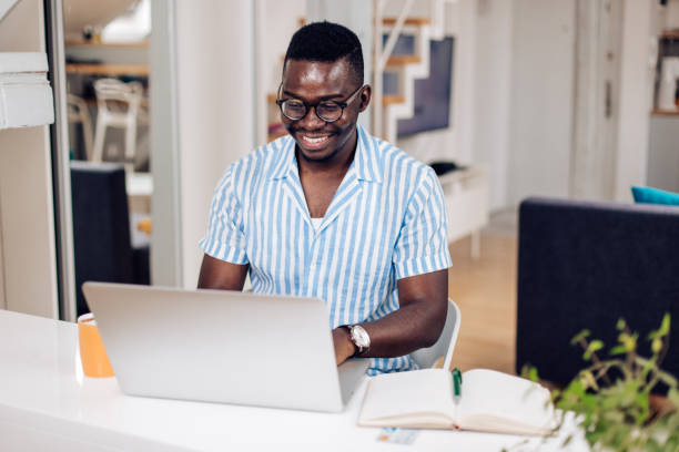 istock African American university student attending an online class from home 1308669969