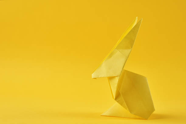 Three rabbits origami with white background