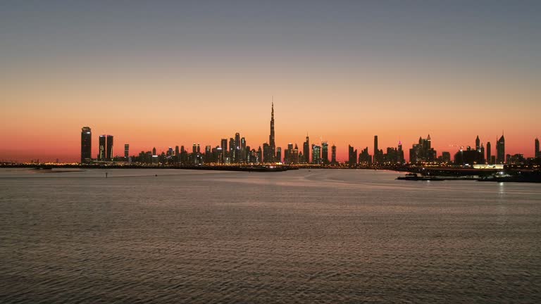 Aerial view of Dubai skyline at night, United Arab Emirates.