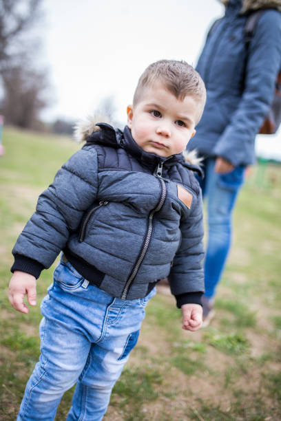 istock Mother and son in the park 1308671999