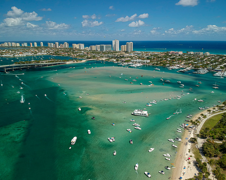 Peanut Island drone photography of boats at the sandbar and Singer Island near West Palm Beach, Florida, Palm Beach County