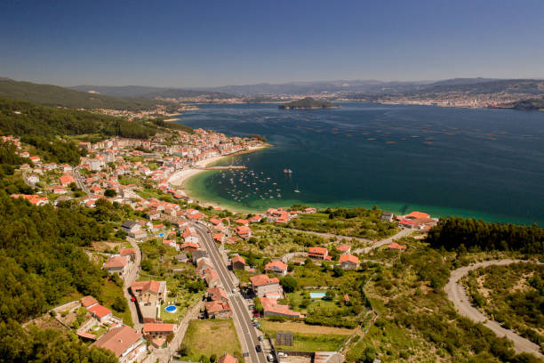 istock Village on the coast with drone 1308673065