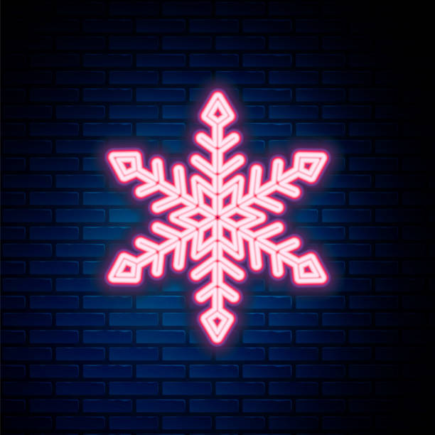 istock Glowing neon line Snowflake icon isolated on brick wall background. Colorful outline concept. Vector 1308673847