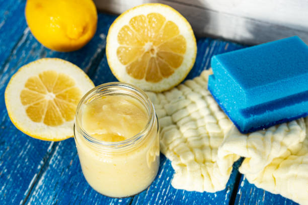 istock Natural cleaner with lemon. Sponge and cloth in the background 1308675689