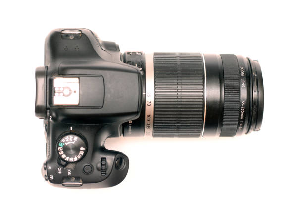 istock No logos digital SLR camera with large telephoto lens. Top view, studio shooting 1308675694