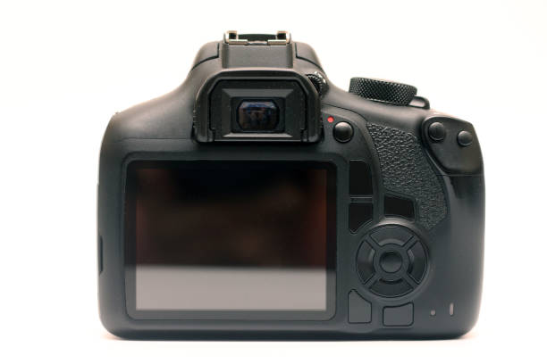 istock Digital SLR crop sensor body without logos. Back view camera with viewfinder, screen and buttons 1308675703