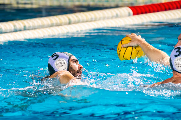 istock Water polo player swimming 1308676080