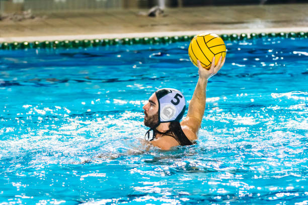 istock Water polo player swimming 1308676790