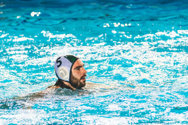 istock Water polo player swimming 1308676840