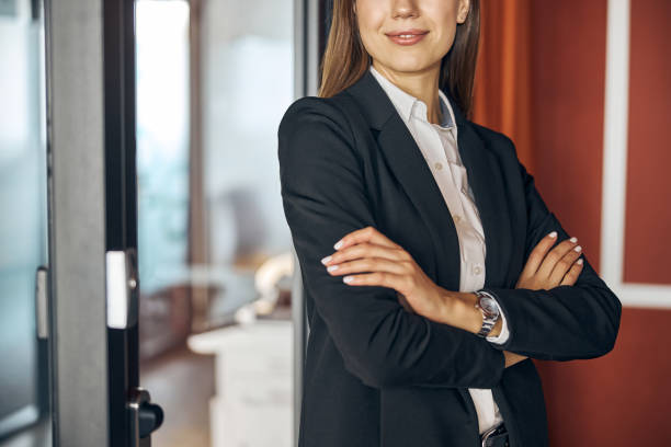 istock Woman with a beautiful smile wearing a stylish jacket 1308677537