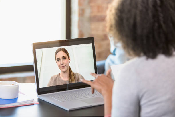 istock Unrecognizable mature teacher tutors student via video conferencing 1308679979