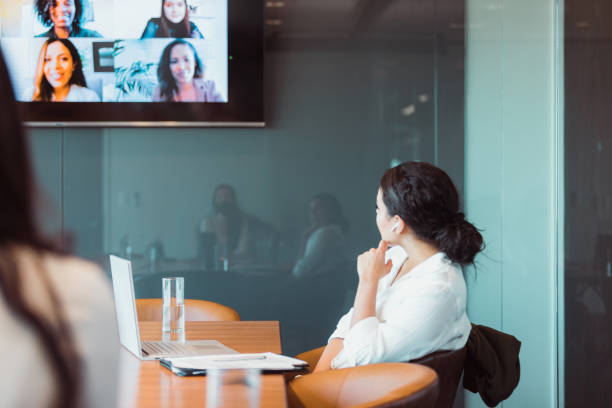 istock Two women social distance and teleconference during coronavirus outbreak 1308680010