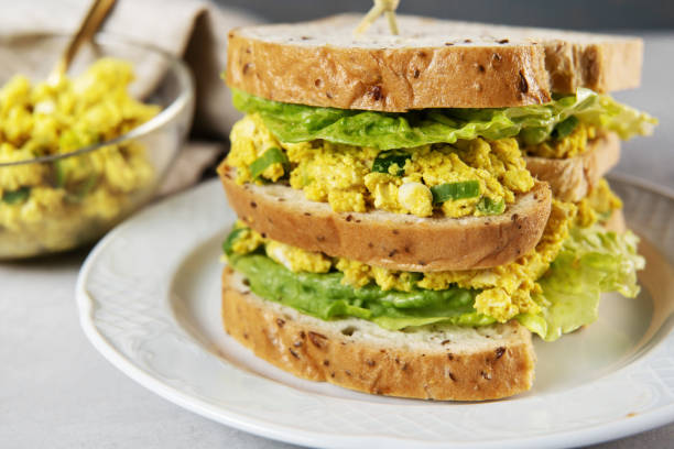 istock Delicious vegan egg salad sandwih club 1308681561