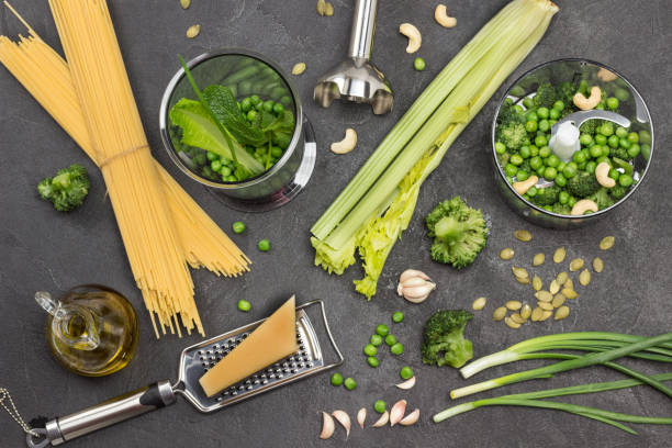 istock Set of vegetables on table and in blender bowl. 1308683448