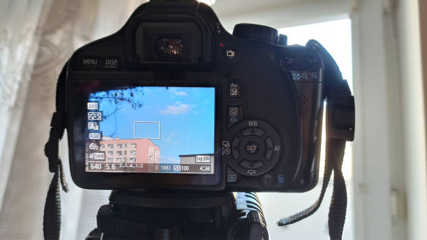 istock LCD display of a DSLR digital camera taking picture of a clouds fixed on a tripod 1308683464