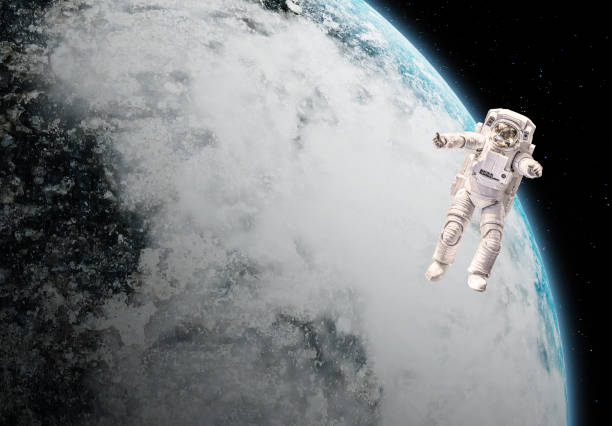 istock 3d image illustration One statue or plastic model astronaut or spaceman floating alone in space galaxy with planet and copy space 1308684399