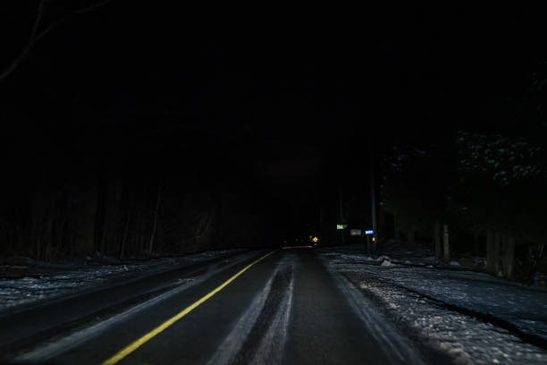 istock Rural Road at night in the Winter 1308692199