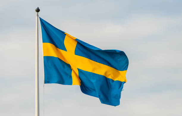 istock Large swedish flag waving in the breeze... 1308699022
