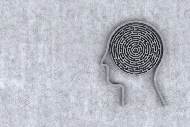 istock Human Head and Inside a Maze with Concrete Background. 3d Rendering 1308699474