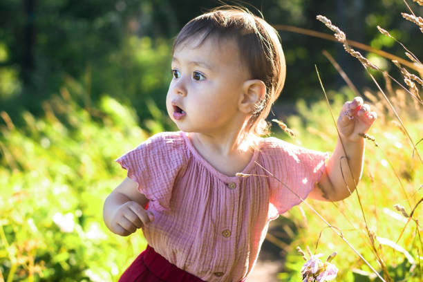 istock The girl turned around in surprise 1308699550