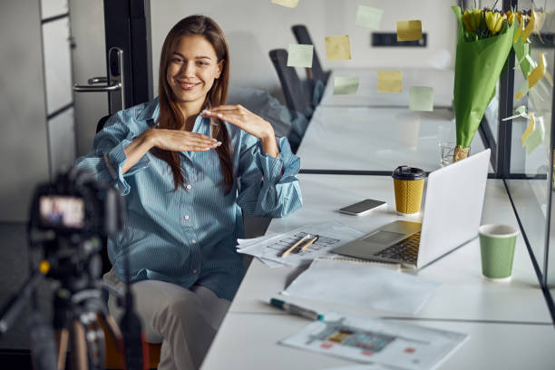 istock Female engineer recording an engineering video blog in the workplace 1308700218