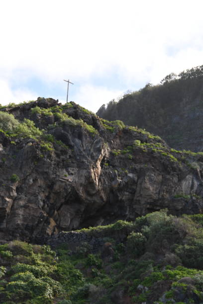 istock rocks with a cross on top 1308703825