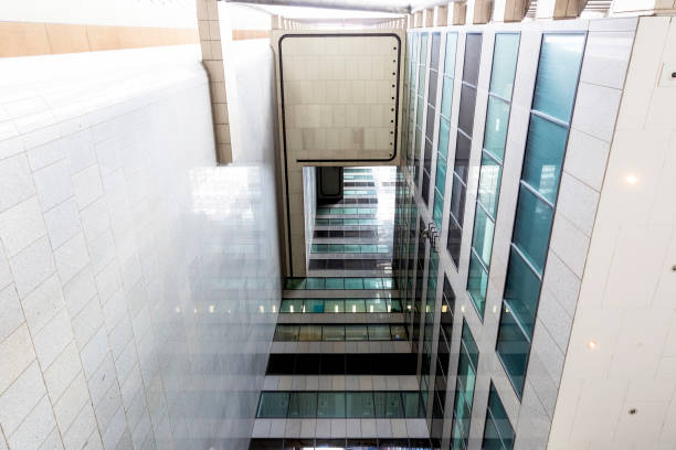 istock Low angle view of modern office building, skyscrapers, background with copy space 1308704603