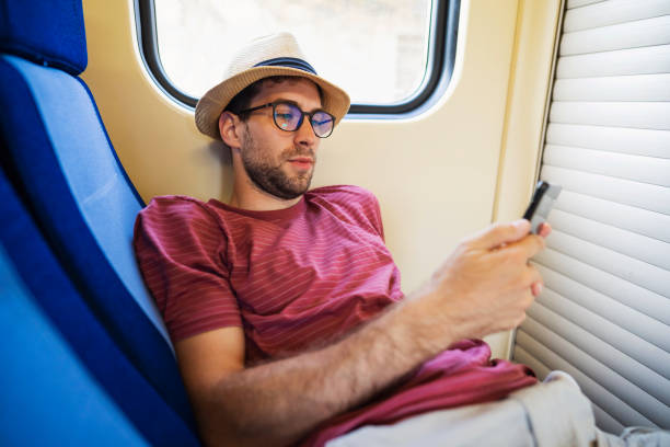 istock Getting lost in his phone on the road 1308705560