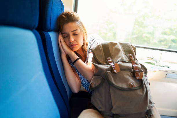 istock Sweet dreams on the train ride 1308705603