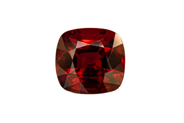 Red Spinel faceted gemstone, square antique cut. White background.